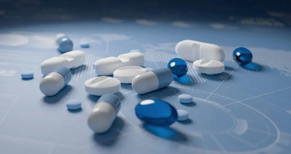 Píldoras, comprimidos y cápsulas en el mapa mundial con cuadros con fondo azul. Concepto de investigación farmacéutica internacional.
